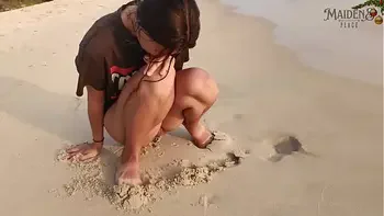 public,beach,young,solo-female,pee
