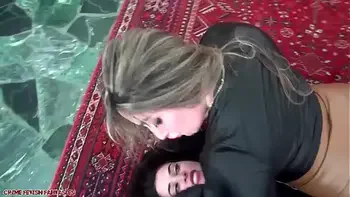 leather-boots,female-fight,hot,leather-pants,scissorhold