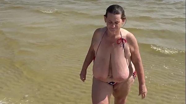 40m,beach-nudity,gilf,flip-flops,huge-saggy-granny-tits