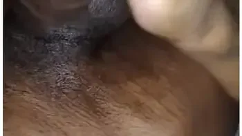 tongue-piercing,ebony-bbc,ball-sucking,wet-handjob,big-black-cock